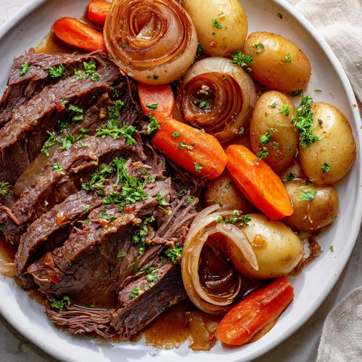 Golden brown seared beef steaks nestled with tender baby potatoes in a rich slow cooker broth