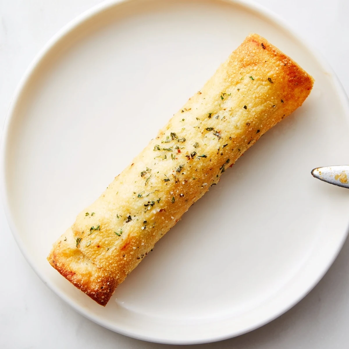 Fresh from the oven Crispy Cheesy Roll Ups brushed with buttery Parmesan, party ready
